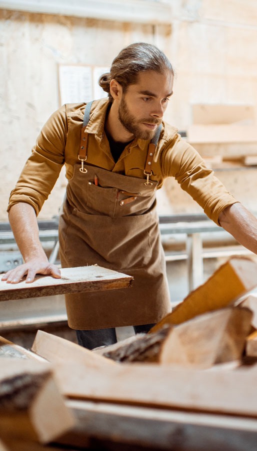 carpenter at the wood storage